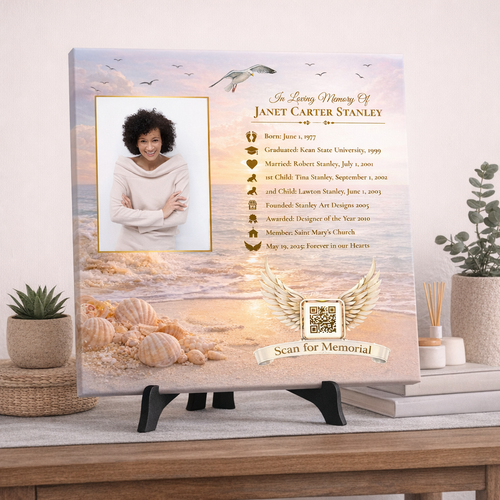 Memorial plaque with a photo of a woman, text, and QR code on a stand.