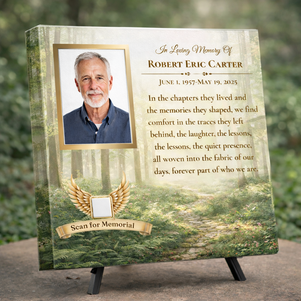 Memorial canvas with a photo of a man and engraved text against a forest background.